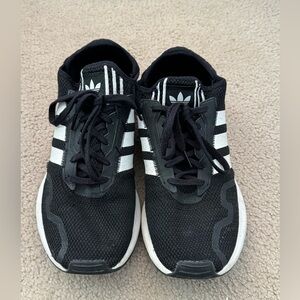 Adidas mens sneaker. Black with white stripes